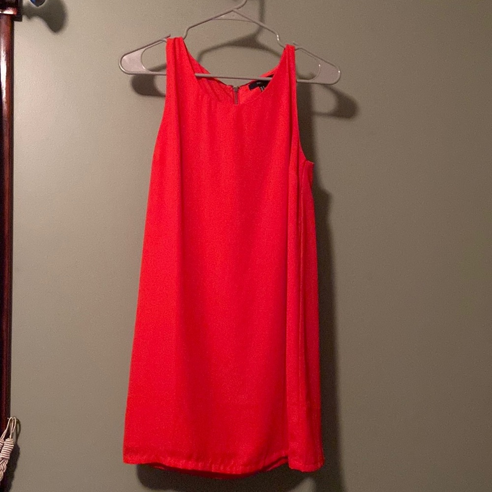 Beautiful summer orange dress. Size small. Gently used.
